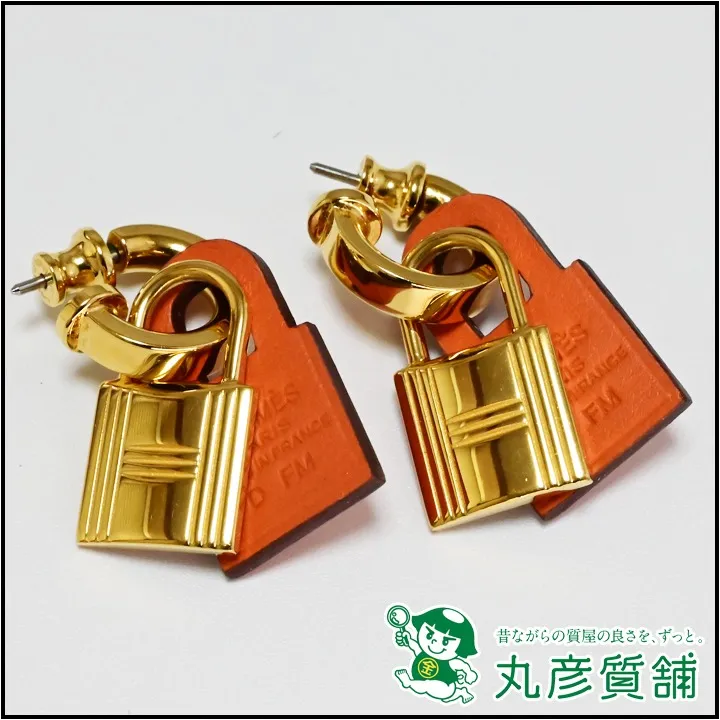 エルメス オーケリー ピアス オレンジ GP